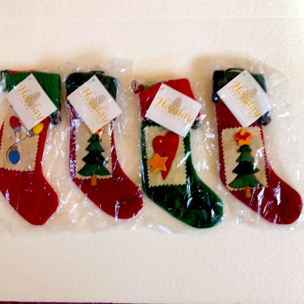 FOUR CHRISTMAS STOCKINGS